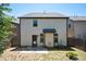 Rear exterior of home with access door to backyard and air conditioning unit at 2753 Trebek Ct, Mcdonough, GA 30253
