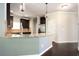 Stylish kitchen featuring granite countertops, stainless steel appliances, and dark wood cabinets at 2753 Trebek Ct, Mcdonough, GA 30253