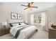 Comfortable bedroom with carpet, natural light, and coordinated decor for a relaxing ambiance at 2955 Pleasant Valley Trl, Cumming, GA 30028