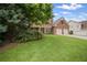 Charming two-story brick home with a lush green lawn and two-car garage at 2955 Pleasant Valley Trl, Cumming, GA 30028