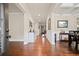 Elegant foyer with hardwood floors, crown molding, and ample natural light at 2955 Pleasant Valley Trl, Cumming, GA 30028