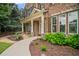 Charming brick home with manicured landscaping and a welcoming front porch at 2955 Pleasant Valley Trl, Cumming, GA 30028
