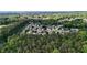 A high angle shot of homes with lush trees and greenery in the surrounding area at 3259 Mcever Park Cir, Acworth, GA 30101