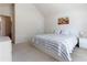 Spacious bedroom with neutral carpet, a bed, and views of an open doorway at 3259 Mcever Park Cir, Acworth, GA 30101