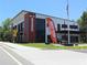Modern brewhouse exterior features a light facade, large windows, and stylish signage at 3259 Mcever Park Cir, Acworth, GA 30101