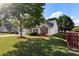 Exterior side view of a single-story home showcasing its well-maintained lawn and charming curb appeal at 3259 Mcever Park Cir, Acworth, GA 30101