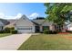Charming single-story home featuring a well-manicured lawn and inviting curb appeal at 3259 Mcever Park Cir, Acworth, GA 30101