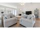 Bright living room with neutral tones, vaulted ceilings, a fireplace, and hardwood floors at 3259 Mcever Park Cir, Acworth, GA 30101