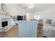 Bright living room featuring hardwood floors, neutral furniture, and a fireplace at 3259 Mcever Park Cir, Acworth, GA 30101