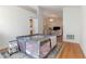 Cozy living room with hardwood floors, featuring a play area and partial view of a Gathering room at 3259 Mcever Park Cir, Acworth, GA 30101