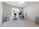 Well-lit home office with a large window, a desk, and comfortable seating at 3259 Mcever Park Cir, Acworth, GA 30101