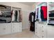 Organized walk-in closet with custom shelving and ample storage for clothing and accessories at 3259 Mcever Park Cir, Acworth, GA 30101