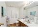 Bathroom featuring a vanity, toilet, and vanity mirror at 373 Dixie Ct, Lawrenceville, GA 30046