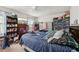 Cozy bedroom features a bed with storage, dresser, and natural light at 373 Dixie Ct, Lawrenceville, GA 30046
