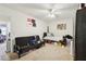 A bedroom with carpeted floors, a ceiling fan, and two beds at 373 Dixie Ct, Lawrenceville, GA 30046