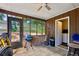 This enclosed back patio features plenty of light and access to laundry facilities at 373 Dixie Ct, Lawrenceville, GA 30046
