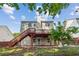 Charming home features a spacious backyard with a deck and patio area, perfect for outdoor entertaining at 1224 Everwood Sw Dr, Marietta, GA 30008
