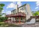 The home's exterior has a brick patio, concrete walkway and a large deck at 1224 Everwood Sw Dr, Marietta, GA 30008