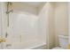 Bathroom with a white shower/tub combination with a shower head and toilet at 1224 Everwood Sw Dr, Marietta, GA 30008