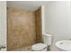 Bathroom with a tiled shower, toilet and sink at 1224 Everwood Sw Dr, Marietta, GA 30008