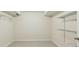 Walk-in closet with tile flooring and wire shelving providing ample storage space at 1224 Everwood Sw Dr, Marietta, GA 30008