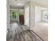 The foyer features wood-look flooring and access to the stairs and living room at 1224 Everwood Sw Dr, Marietta, GA 30008