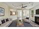 Staged living room featuring hardwood floors, fireplace, natural light, and stylish decor at 1224 Everwood Sw Dr, Marietta, GA 30008