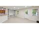 Open living area with recessed lighting, built-in shelves, and a door leading outside at 1224 Everwood Sw Dr, Marietta, GA 30008