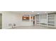 Open living area with recessed lighting, built-in shelves, and a view into kitchen at 1224 Everwood Sw Dr, Marietta, GA 30008
