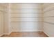 Spacious walk-in closet with carpet and wire shelving, providing ample storage space at 1224 Everwood Sw Dr, Marietta, GA 30008