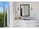 Modern bathroom with a granite countertop, vessel sink, and large window with wooded views at 1285 Stuart Rdg, Johns Creek, GA 30022