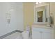 Modern bathroom with white tile shower, floating vanity, and ample lighting at 1285 Stuart Rdg, Johns Creek, GA 30022