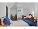 Comfortable bedroom featuring twin beds, hardwood floors, and a well-lit ambiance at 1285 Stuart Rdg, Johns Creek, GA 30022
