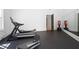 Bright gym featuring fitness equipment, rubber flooring, and ample workout space at 1285 Stuart Rdg, Johns Creek, GA 30022