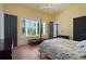 Bright, spacious main bedroom with hardwood floors and large window at 1285 Stuart Rdg, Johns Creek, GA 30022