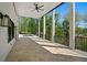 Spacious covered patio overlooking the beautiful pool, perfect for entertaining and relaxing at 1285 Stuart Rdg, Johns Creek, GA 30022
