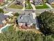 Aerial view of home showcasing the backyard, pool, and beautifully landscaped property at 1829 Alcovy Shoals Blf, Lawrenceville, GA 30045
