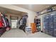 Spacious walk-in closet with lots of shelving and mirror at 1829 Alcovy Shoals Blf, Lawrenceville, GA 30045