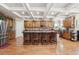 Spacious kitchen featuring a large island with bar seating, stainless steel appliances, and ample cabinetry at 1829 Alcovy Shoals Blf, Lawrenceville, GA 30045