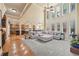 Open-concept living room seamlessly connects to the kitchen, creating a bright and airy atmosphere at 1829 Alcovy Shoals Blf, Lawrenceville, GA 30045