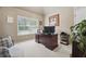 Home office with desk, natural light, and space for productivity at 1829 Alcovy Shoals Blf, Lawrenceville, GA 30045