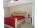 Spacious main bedroom featuring a large bed, neutral walls, and ceiling fan for added comfort at 2019 Briar Creek Ne Ct, Conyers, GA 30012