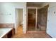 Bathroom featuring a walk-in shower and separate toilet at 4060 San Marco Way, Douglasville, GA 30135