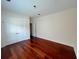Bedroom with hardwood floors and a double door closet providing ample storage at 4060 San Marco Way, Douglasville, GA 30135