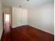 Bedroom featuring hardwood floors and a double door closet at 4060 San Marco Way, Douglasville, GA 30135