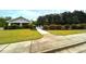 The community clubhouse and pool area features manicured landscaping and a relaxing spot at 4060 San Marco Way, Douglasville, GA 30135