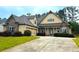 Beautiful two-story home with stone accents, manicured landscaping, and attached garage at 4060 San Marco Way, Douglasville, GA 30135
