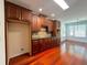 Well-equipped kitchen with rich wood cabinetry, hardwood floors, and a functional layout for cooking at 4060 San Marco Way, Douglasville, GA 30135