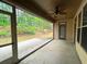 Screened patio offers an inviting outdoor living space and lovely nature views at 4060 San Marco Way, Douglasville, GA 30135