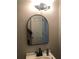Bathroom showcasing a mirror and vanity under soft lighting for a relaxing space at 75 Oak Hill Dr, Covington, GA 30016